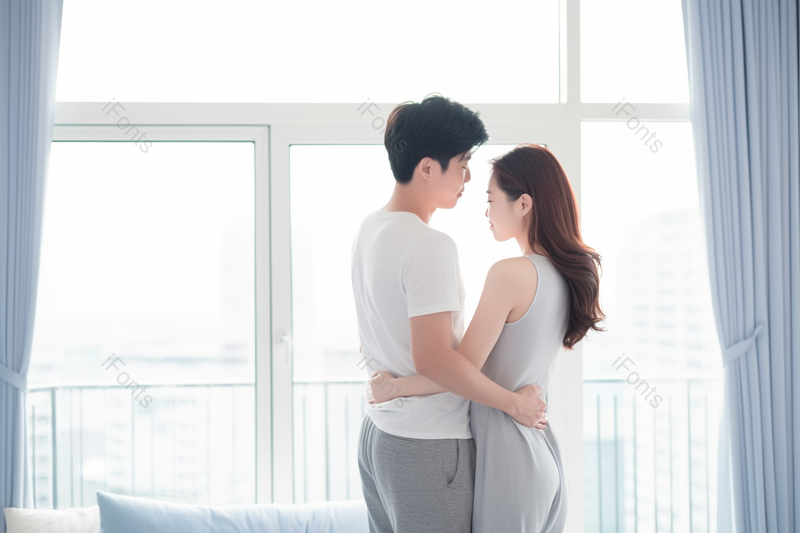 年轻情侣在窗边相拥拥抱,高清,摄影图,摄影图片,图片大全,摄影图免费下载